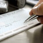 Can you deposit someone else's check in your account